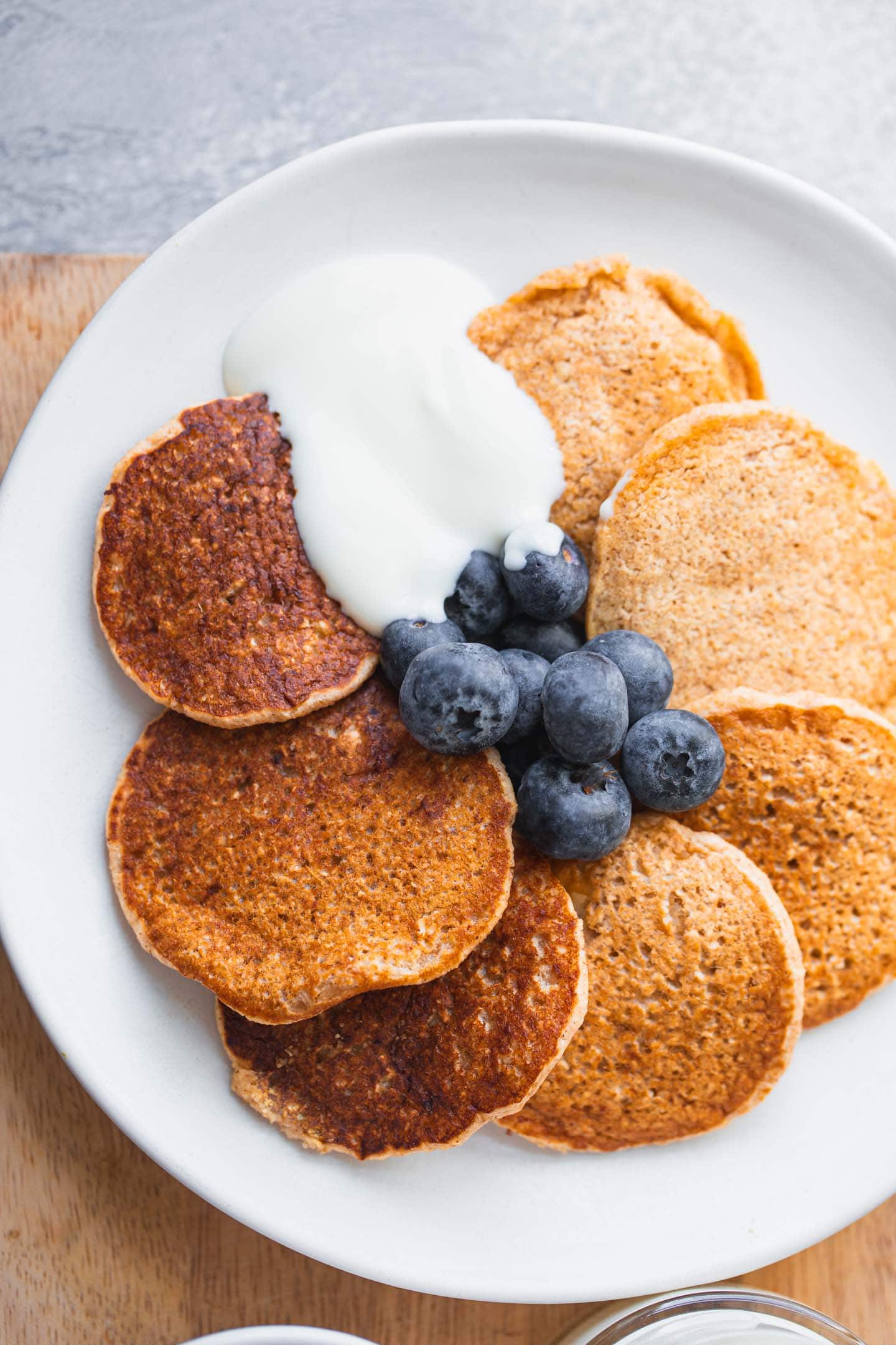 Cinnamon pancakes with berries and soy yoghurt