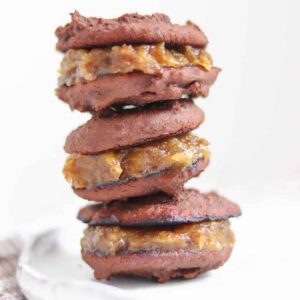 Vegan and gluten-free black bean cookie sandwiches with a date caramel filling