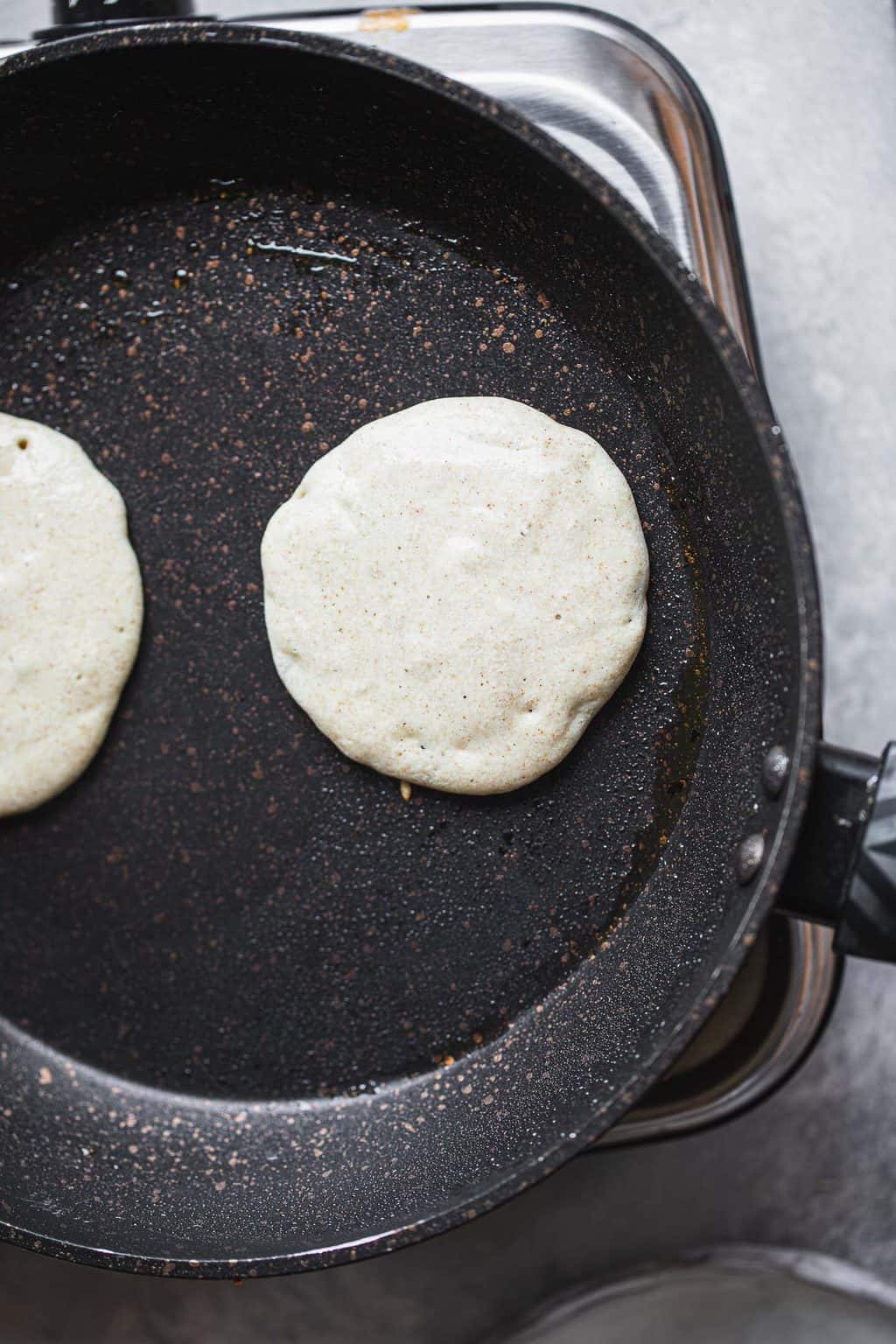 Buckwheat pancakes in a frying pan