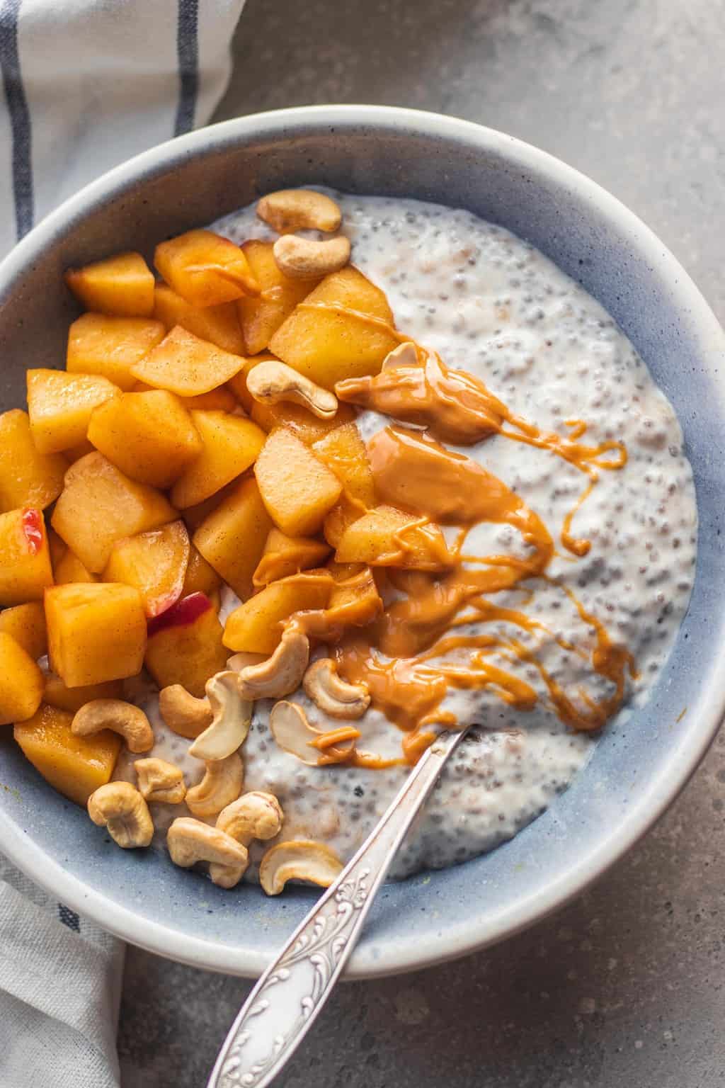 Vegan coconut chia pudding with apples and peanut butter