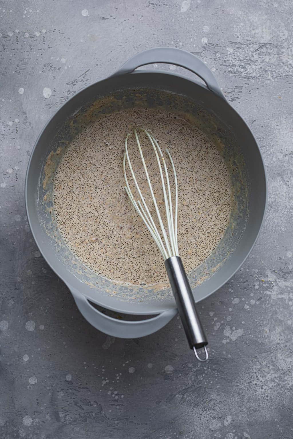 Buckwheat crepe batter in a mixing bowl
