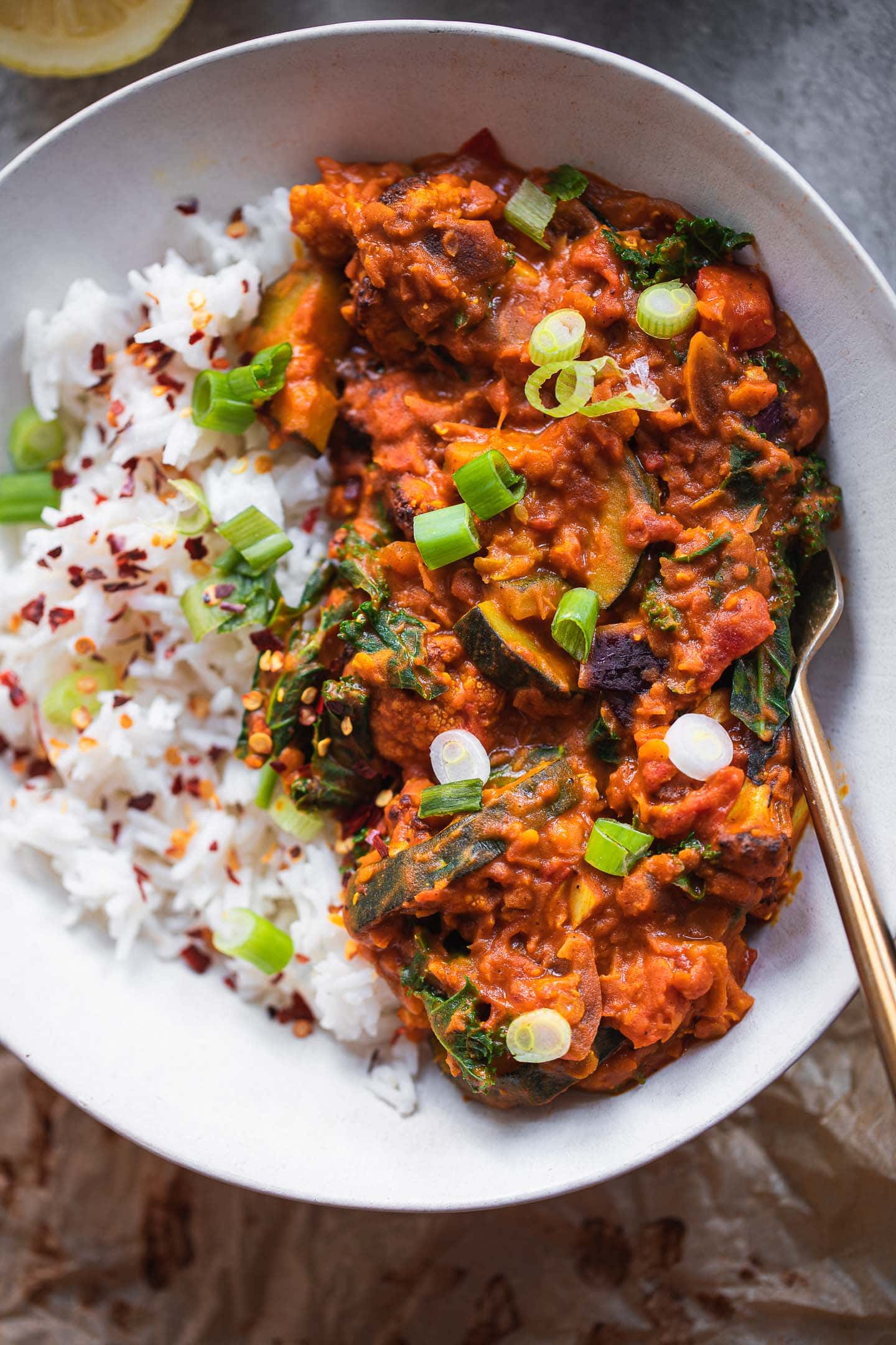 Bowl of vegan Dahl with red lentils and cauliflower