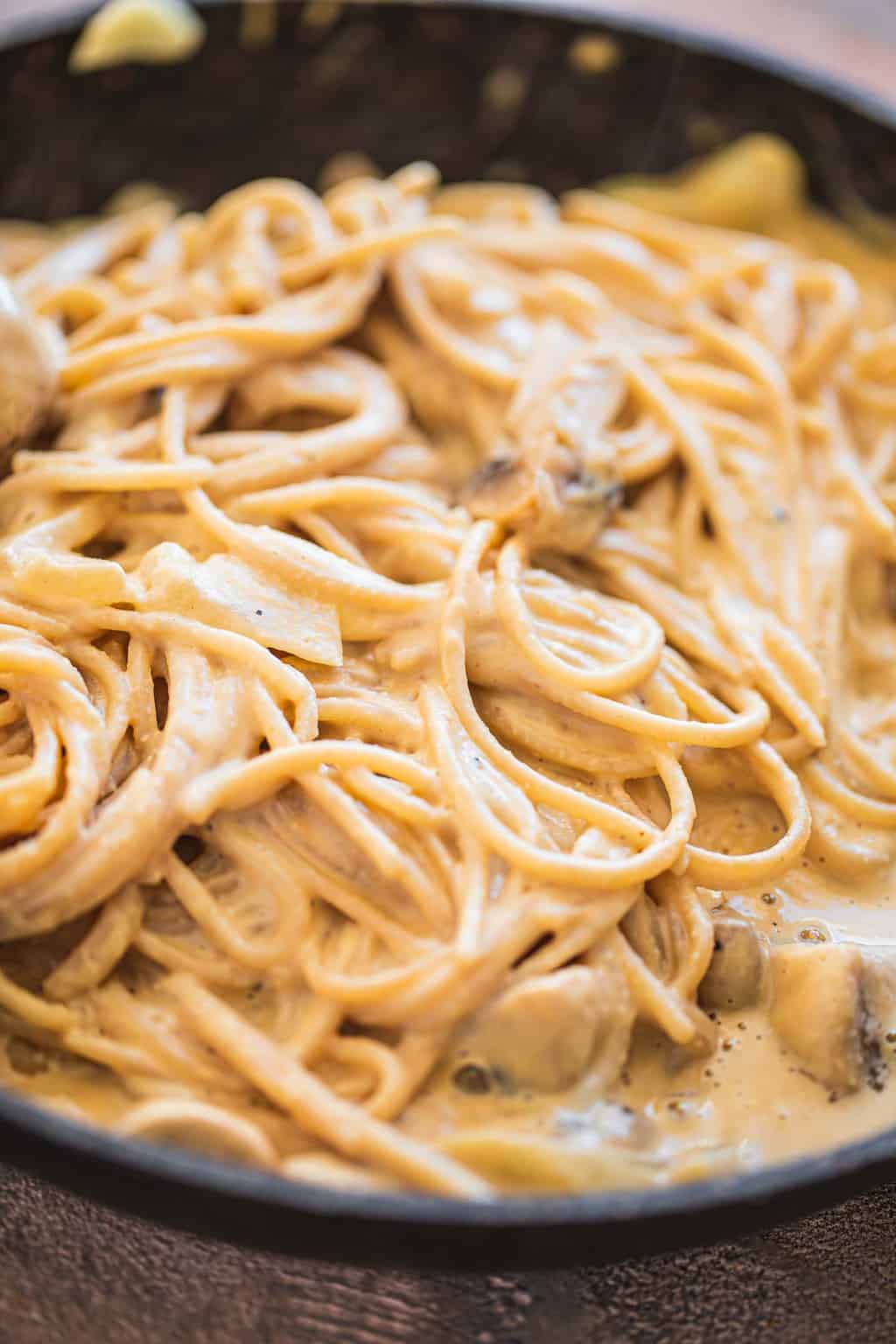 Creamy vegan pasta in a saucepan
