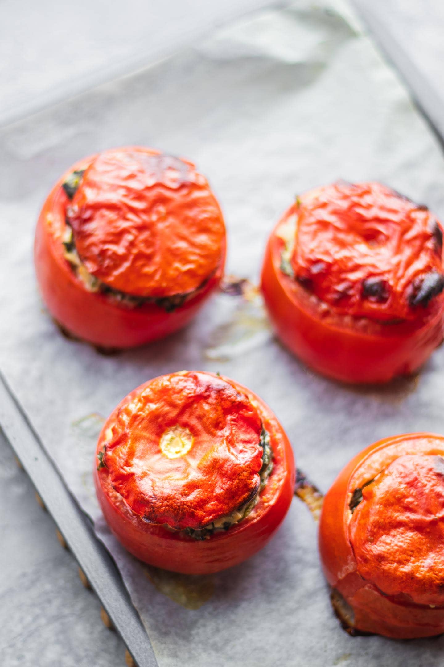 Vegan stuffed tomatoes with creamed spinach 