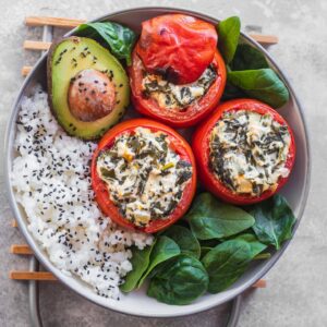 Vegan stuffed tomatoes with creamed spinach
