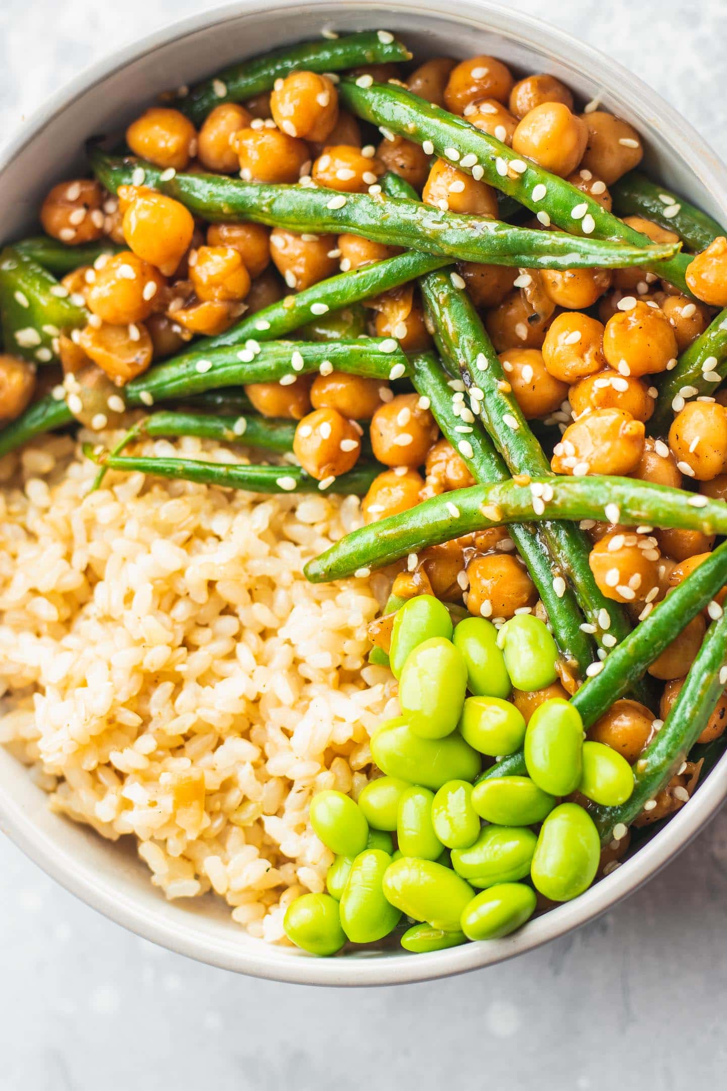 Bowl with sweet and sour chickpeas and green beans and edamame