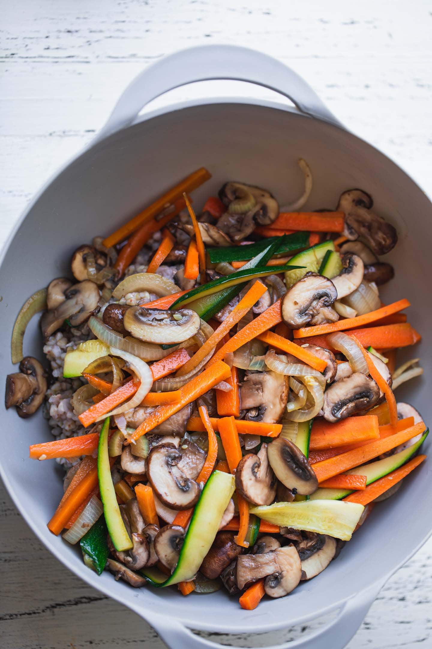 Vegetables and buckwheat in a mixing bowl