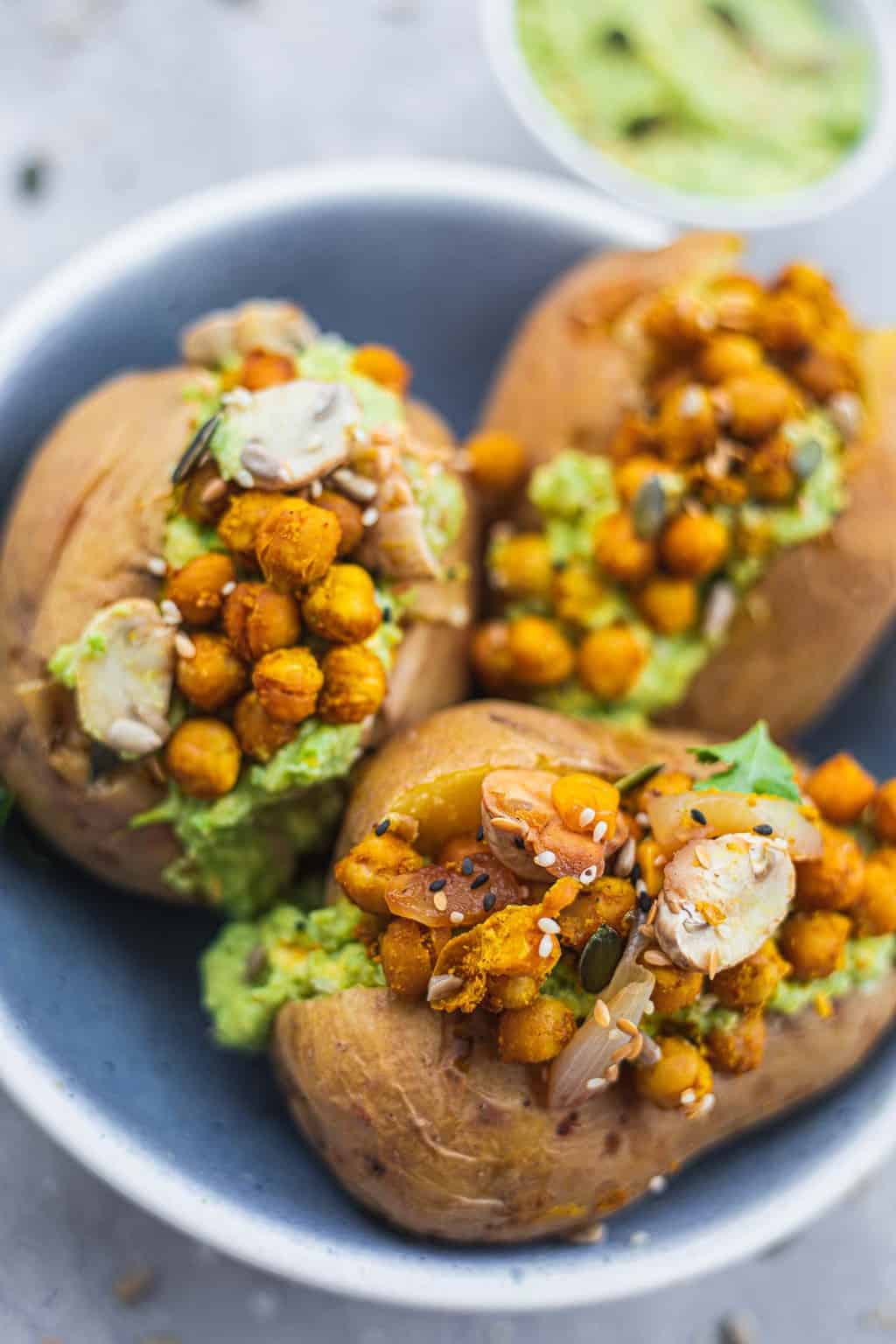 Bowl of potatoes stuffed with chickpeas and avocado