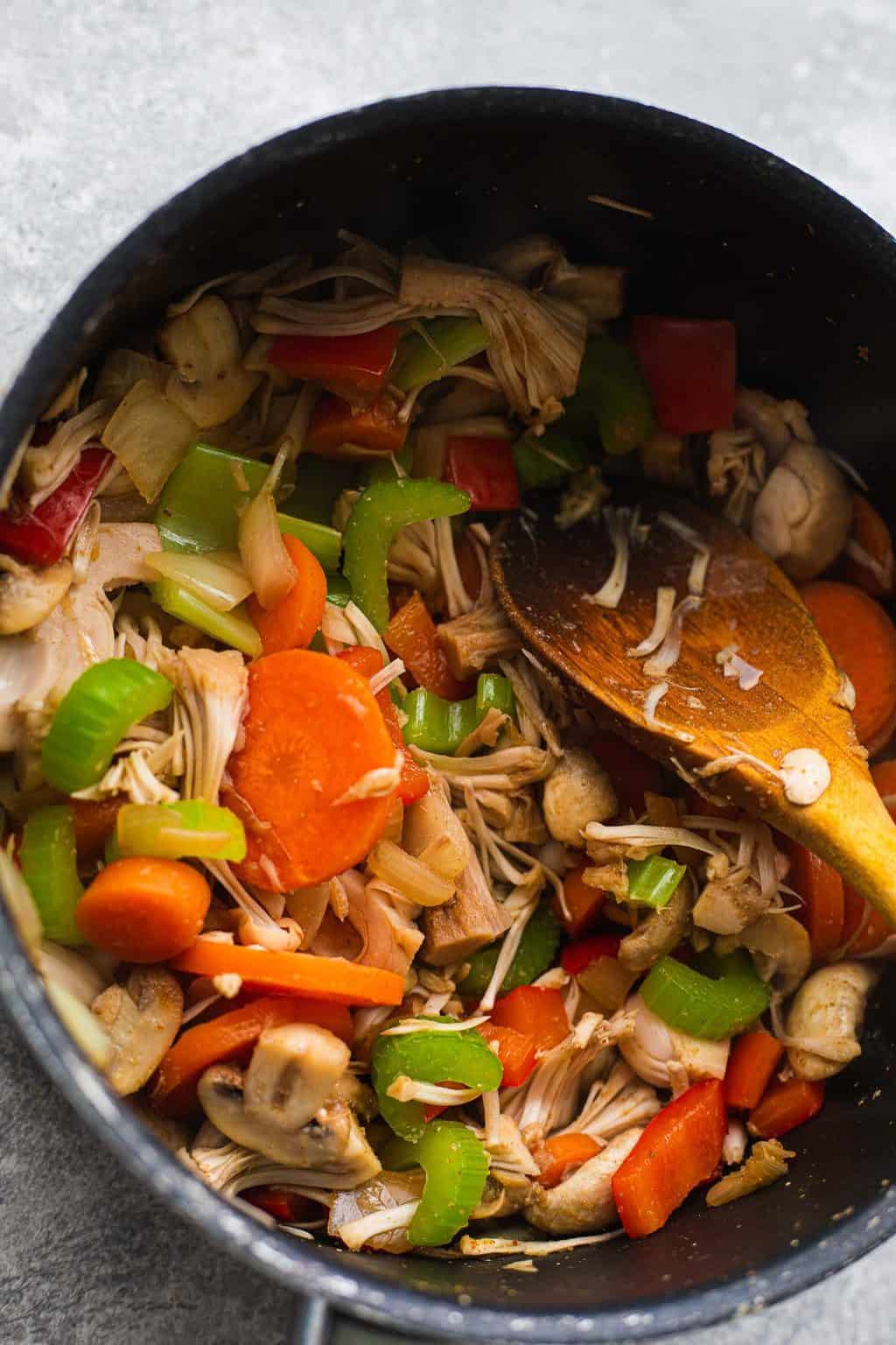 Vegetables and jackfruit in a saucepan