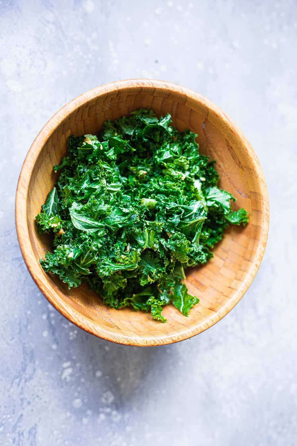 Massaged kale in a mixing bowl