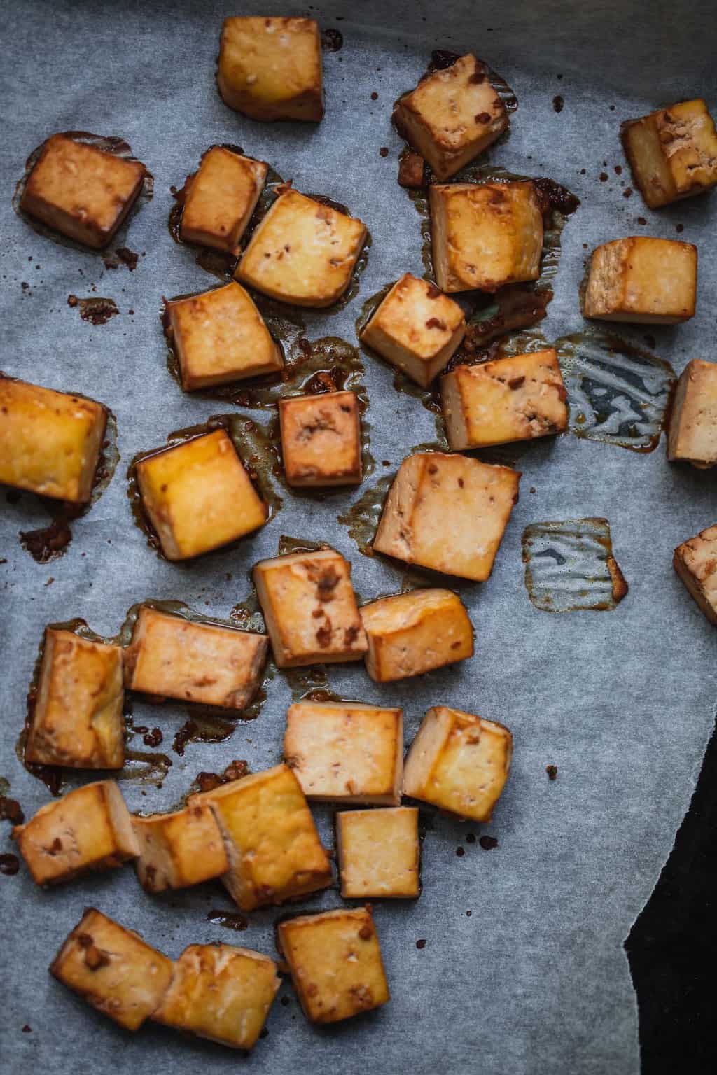 Baked tofu on on a baking tray
