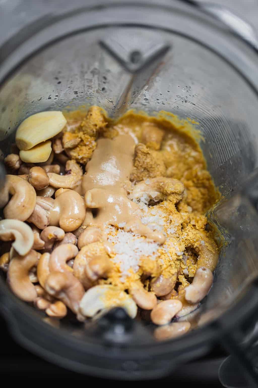 Vegan sauce ingredients in a food processor
