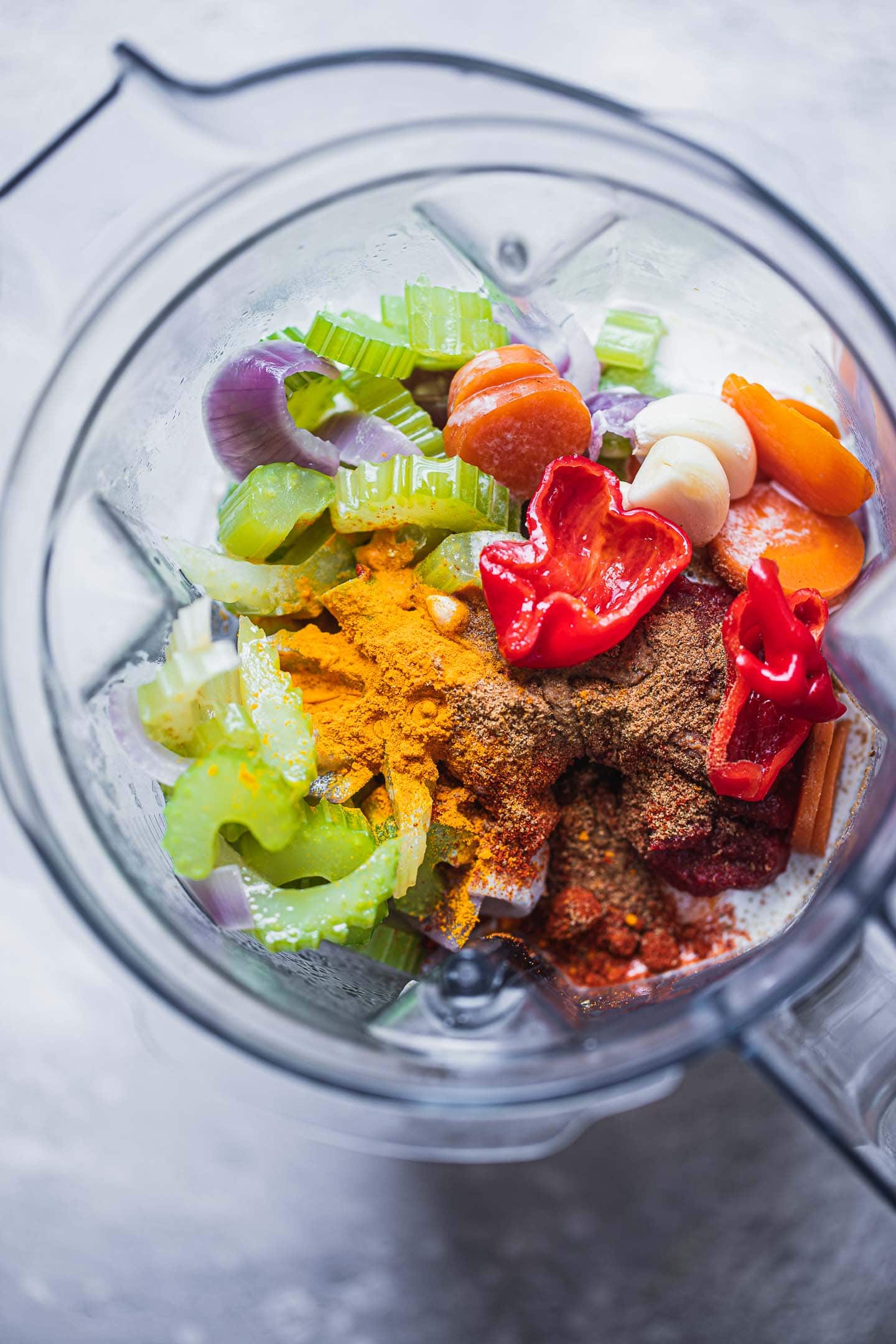 Butternut squash soup ingredients in a blender