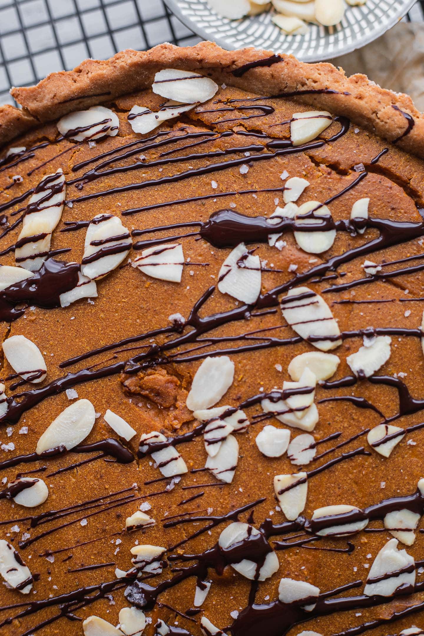 Closeup of a pumpkin pie with chocolate