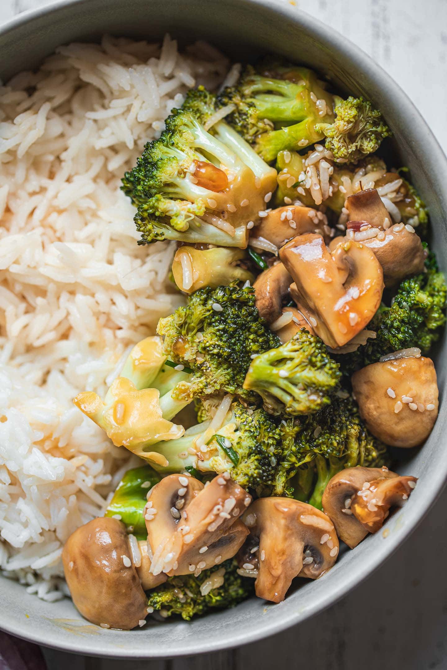 Closeup of a vegetable stir-fry with broccoli and mushrooms
