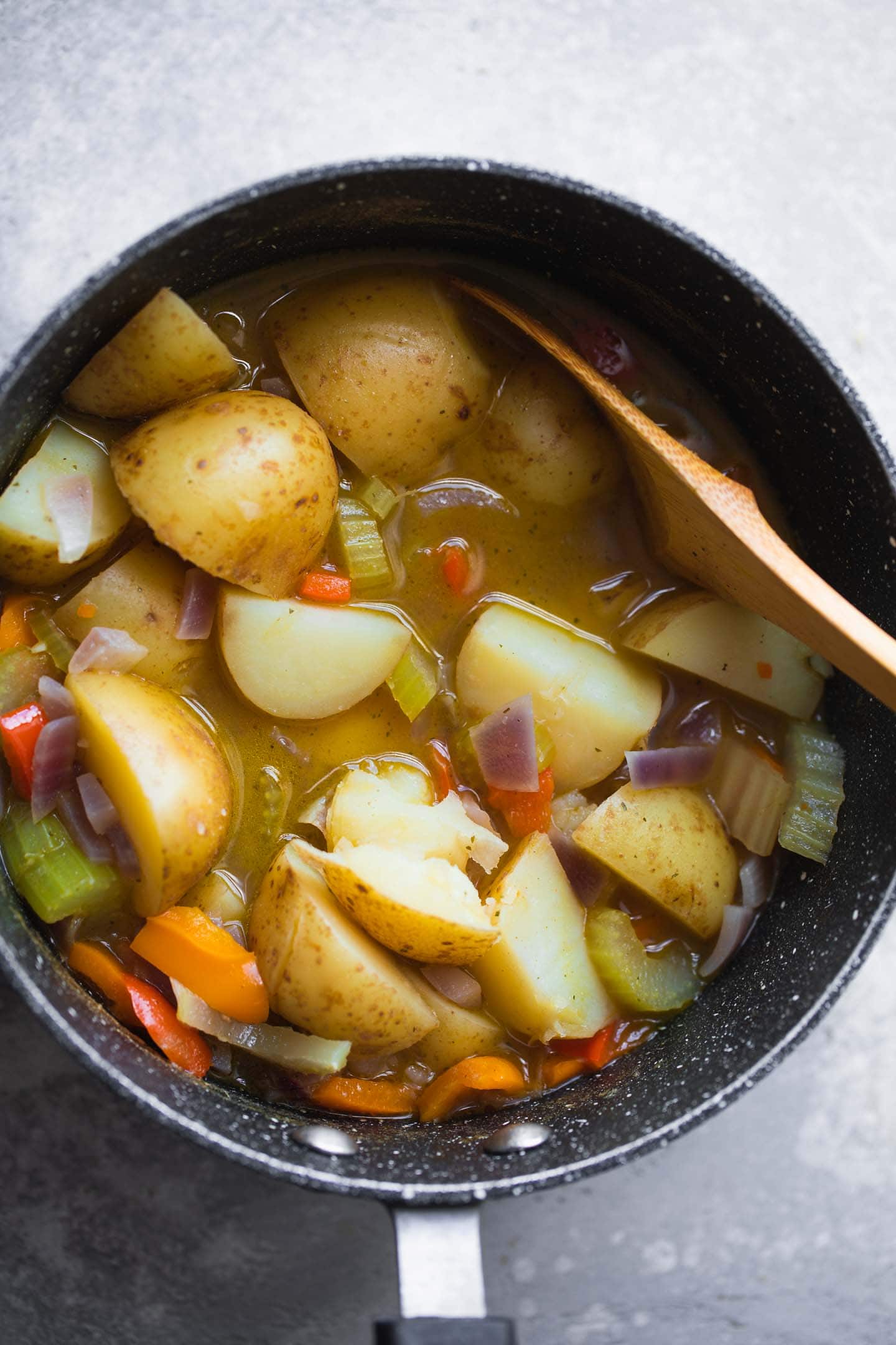 Potatoes and vegetables in a saucepan