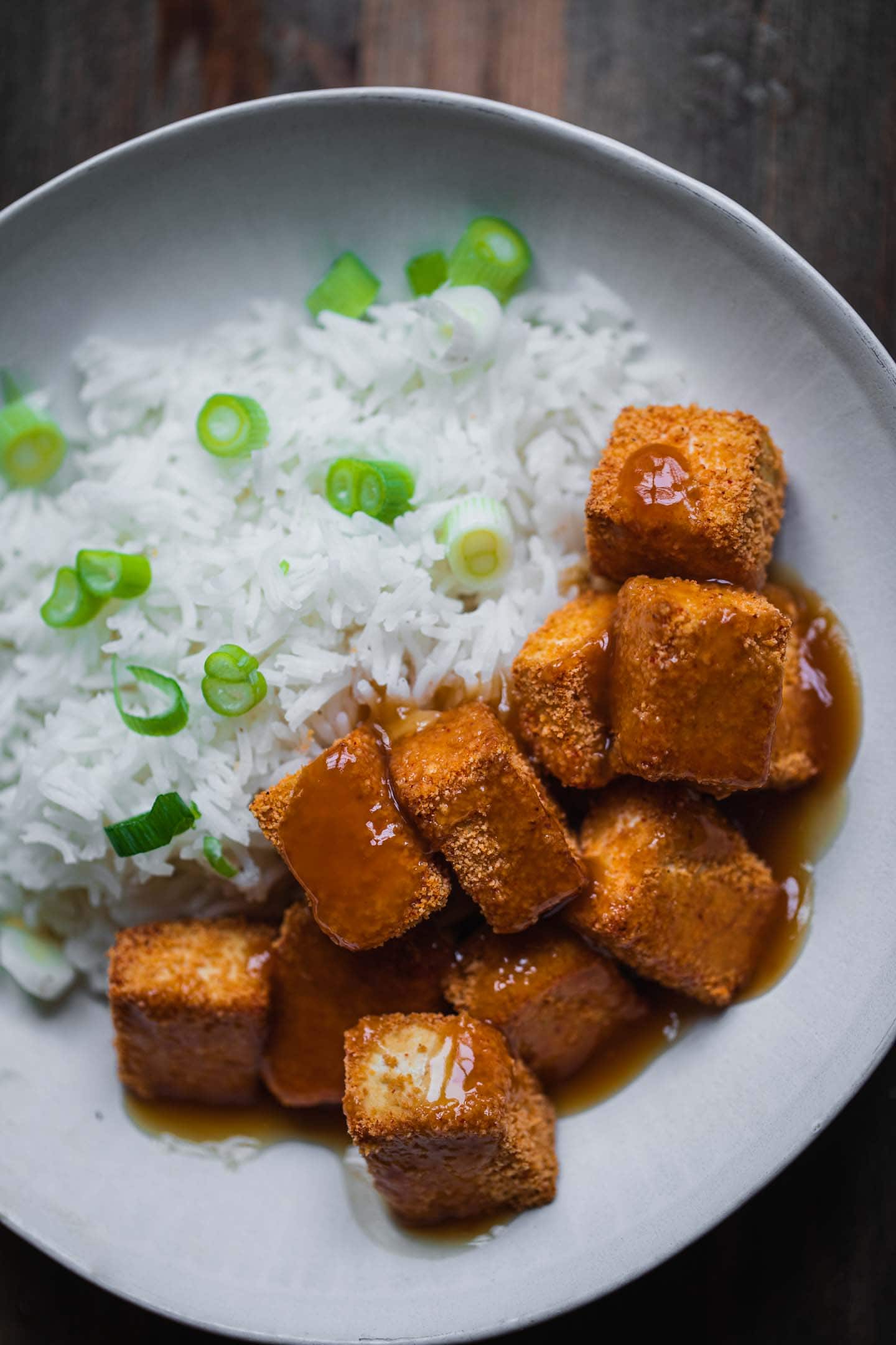 Baked tofu cubes with rice and sweet and sour sauce