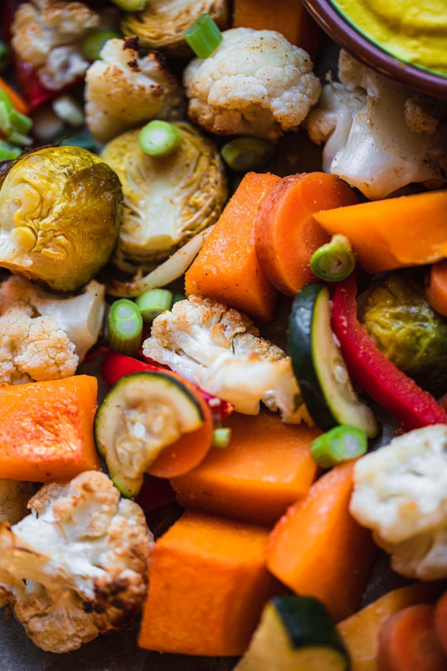 Closeup of seasonal vegetables on a baking tray