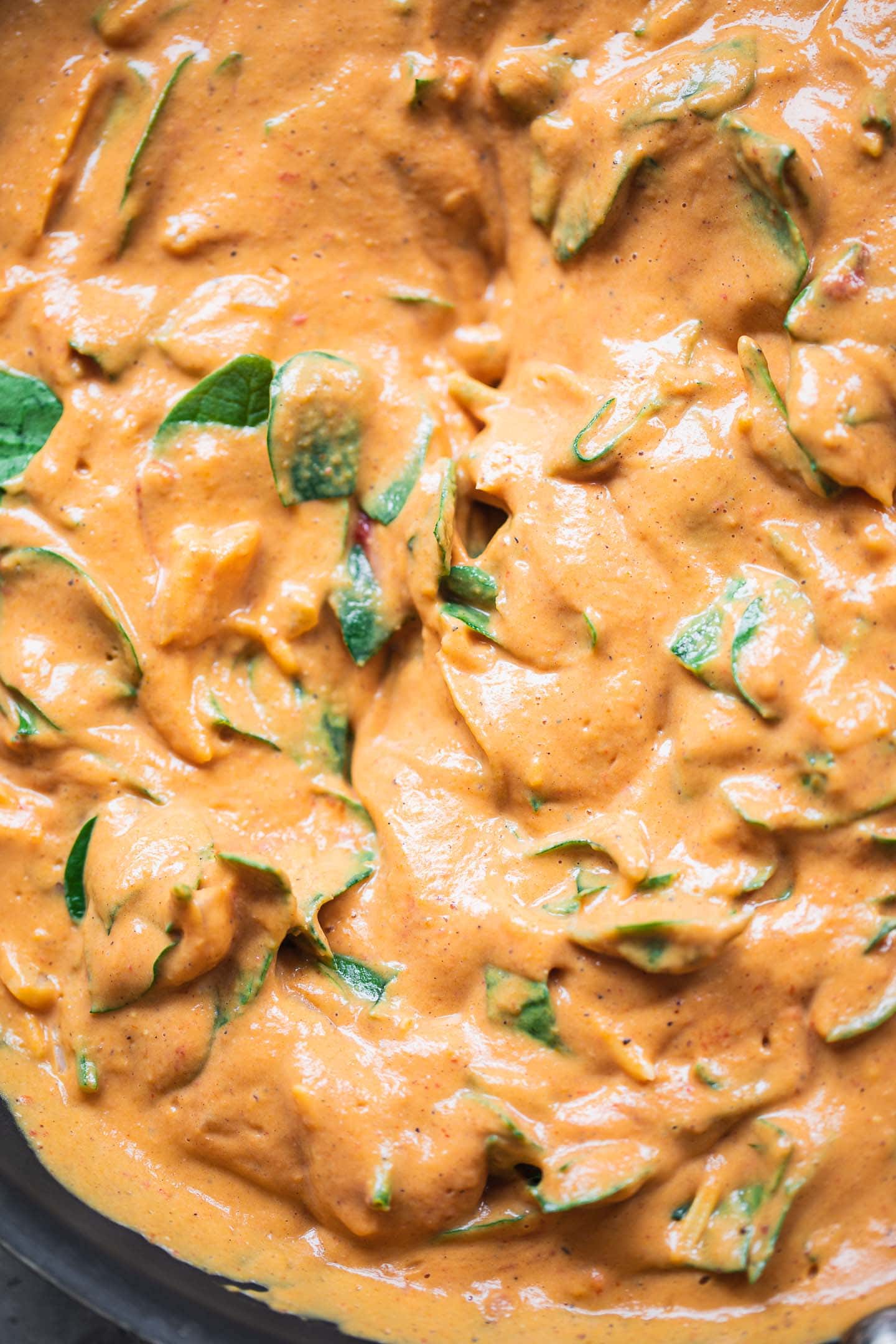 Pasta with a butternut squash sauce in a pan