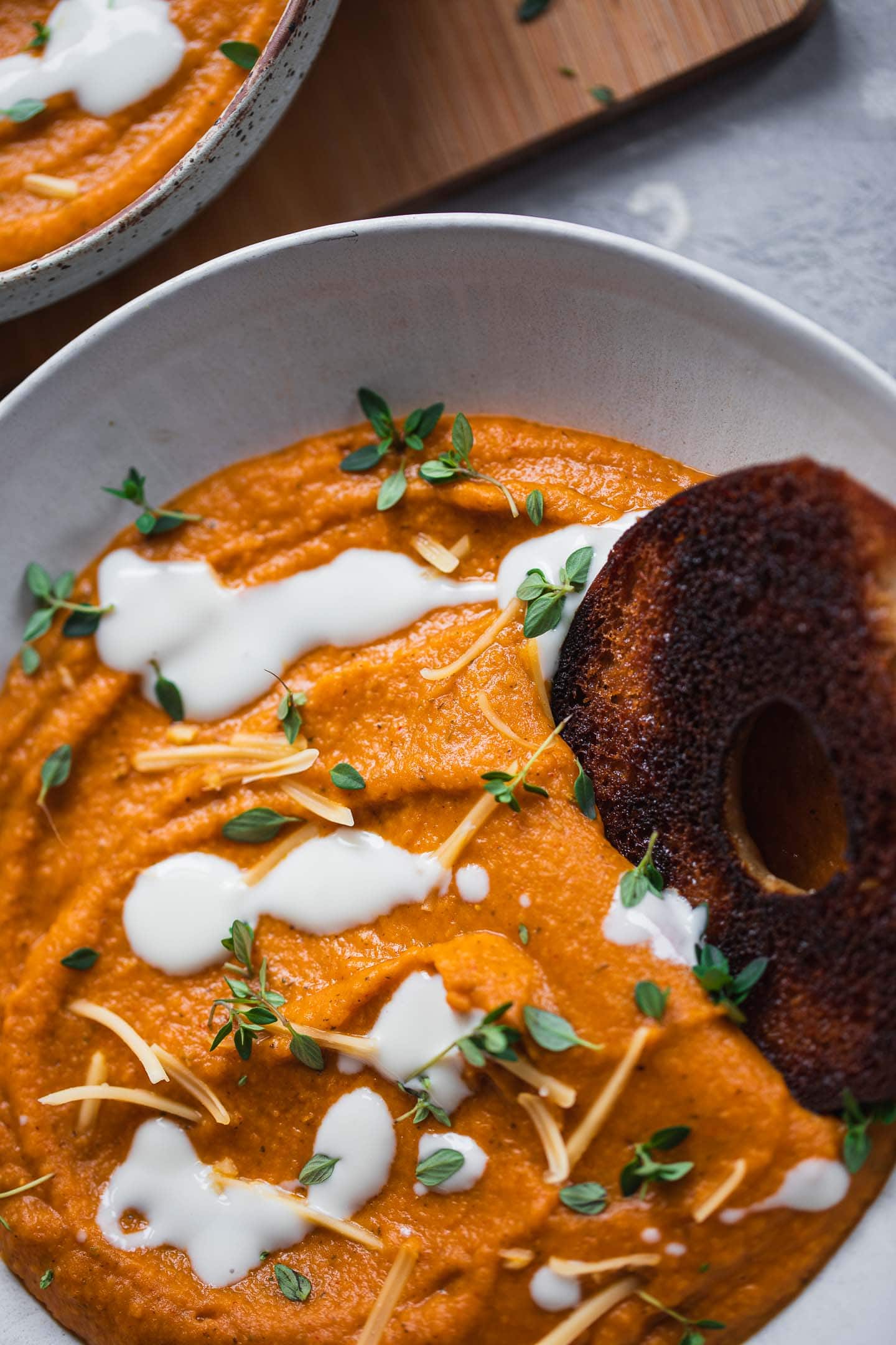 Sweet potato soup with a bagel and coconut milk
