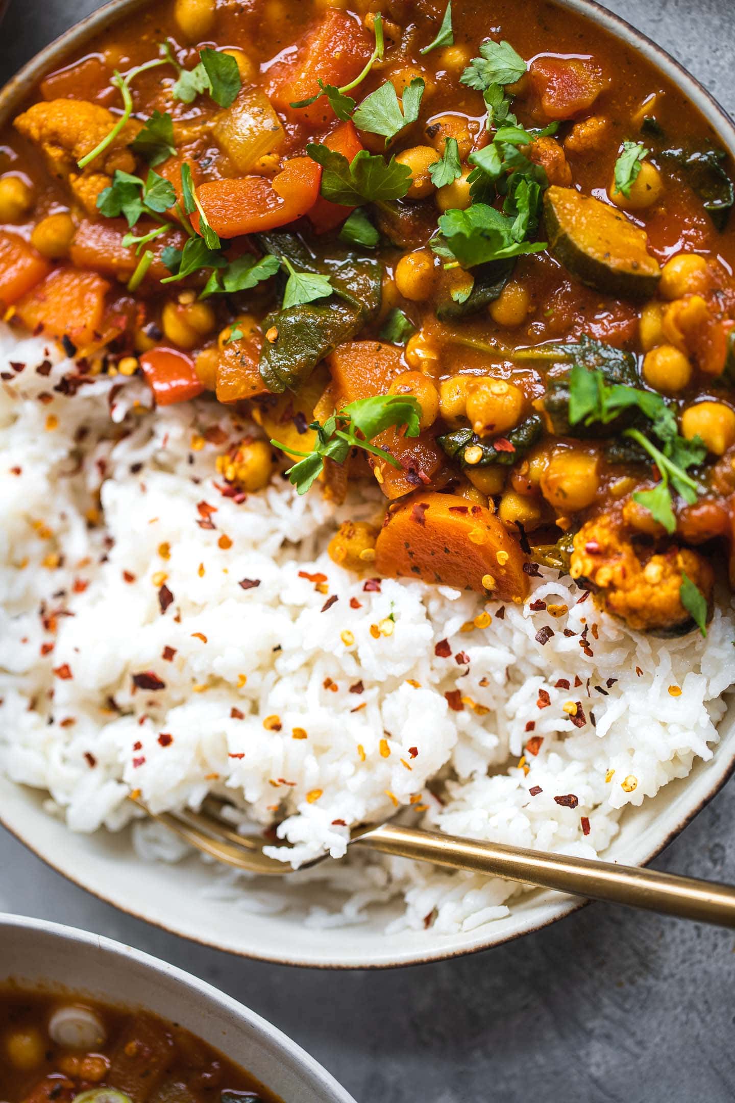Closeup of a bowl of chickpea stew with rice