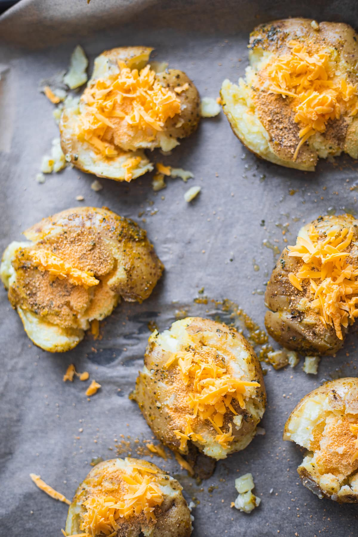 Smashed potatoes with vegan cheese