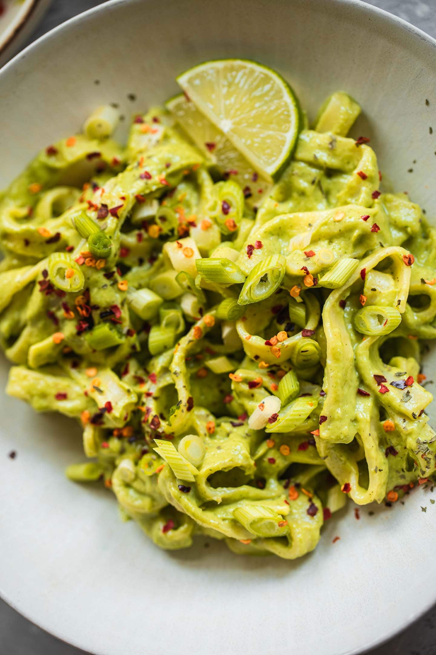 Vegan avocado pasta with lime and chilli flakes