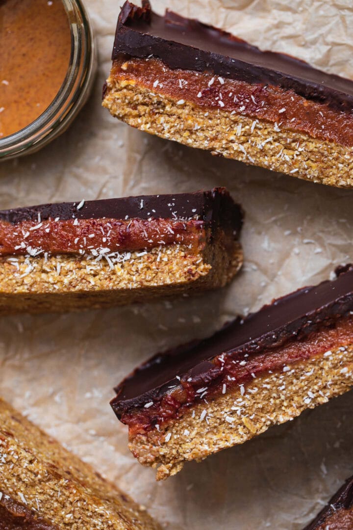 Caramel bars on a sheet of parchment paper