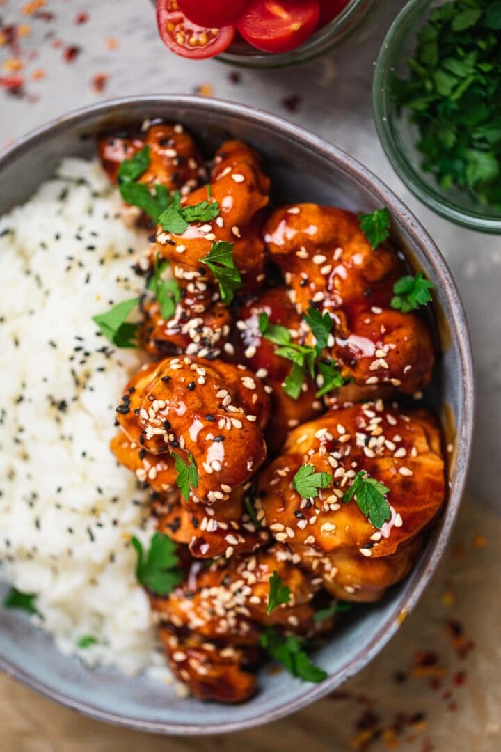 Closeup of cauliflower wings served with rice
