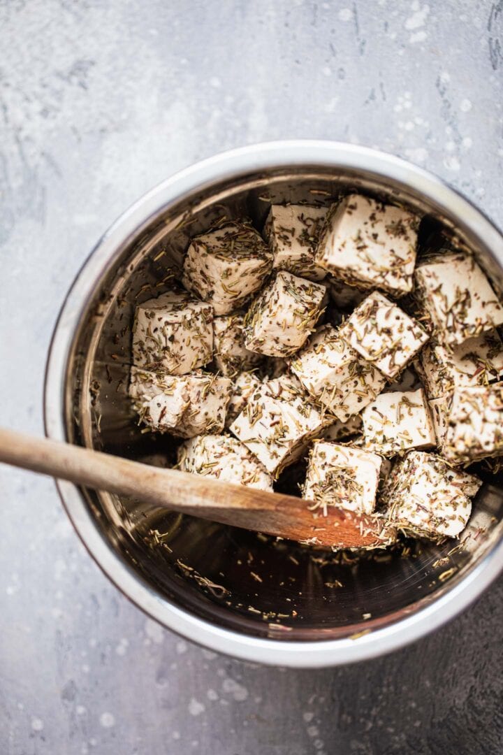 Tofu feta in a mixing bowl