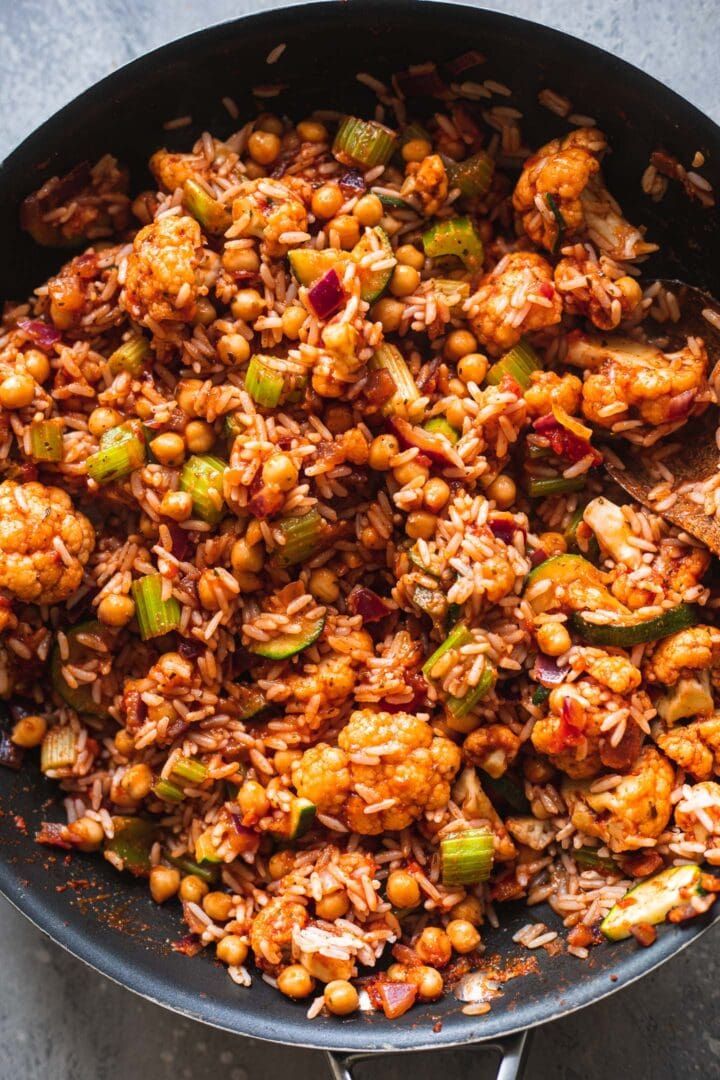 Vegetables, chickpeas and rice in a frying pan