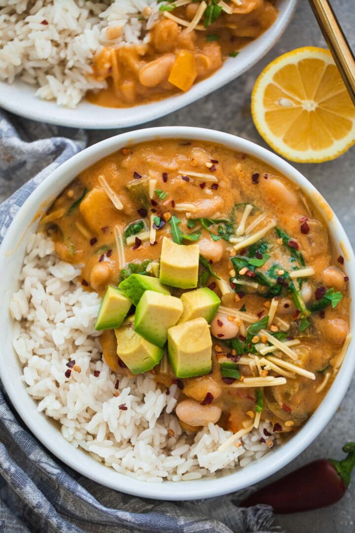 Vegetarian chili, rice and avocado in a bowl