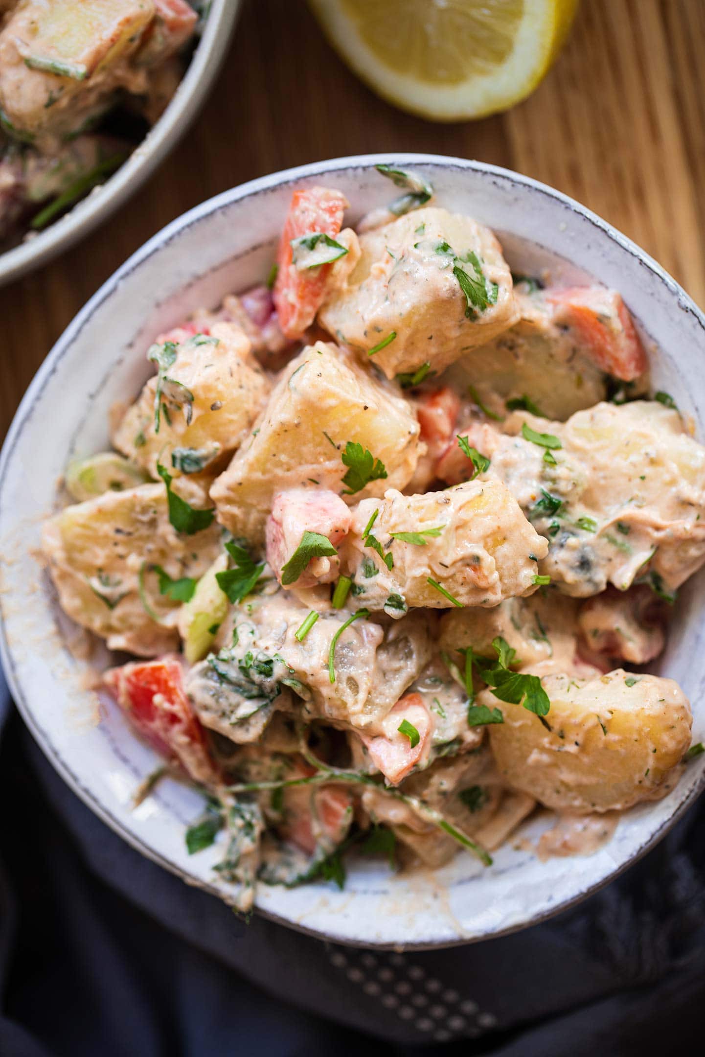 Bowl of vegetable potato salad with a dairy-free sauce