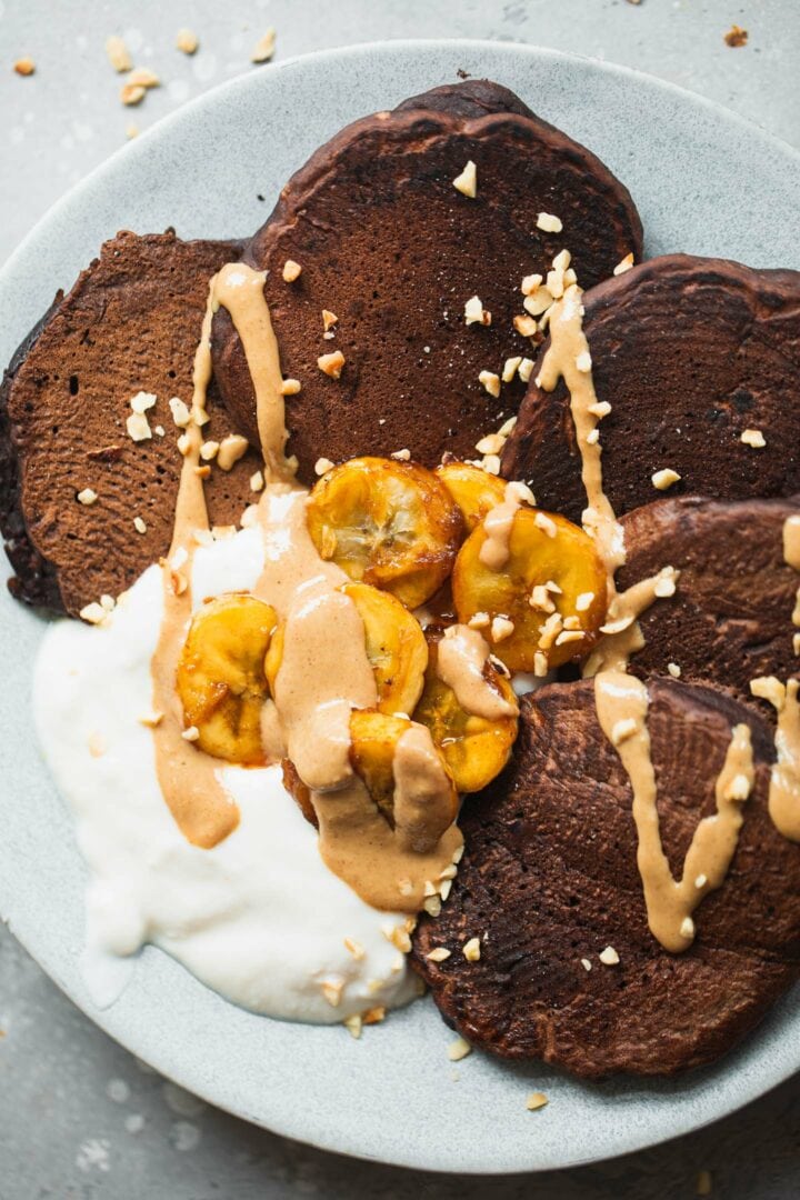 Cacao pancakes with soy yoghurt