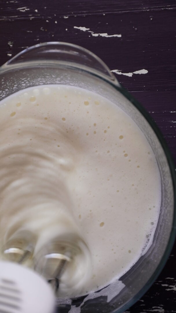 Aquafaba being whipped in a bowl