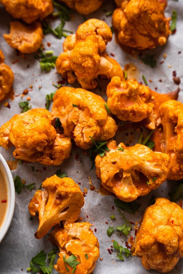 Crispy cauliflower wings on a baking tray