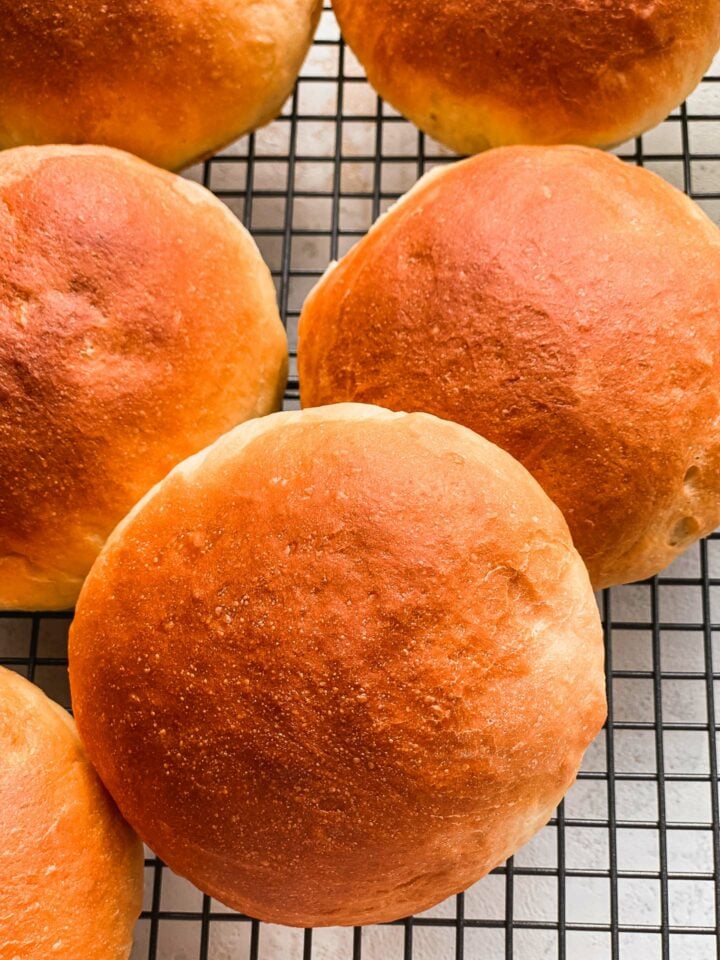 Bread rolls on a cooling rack