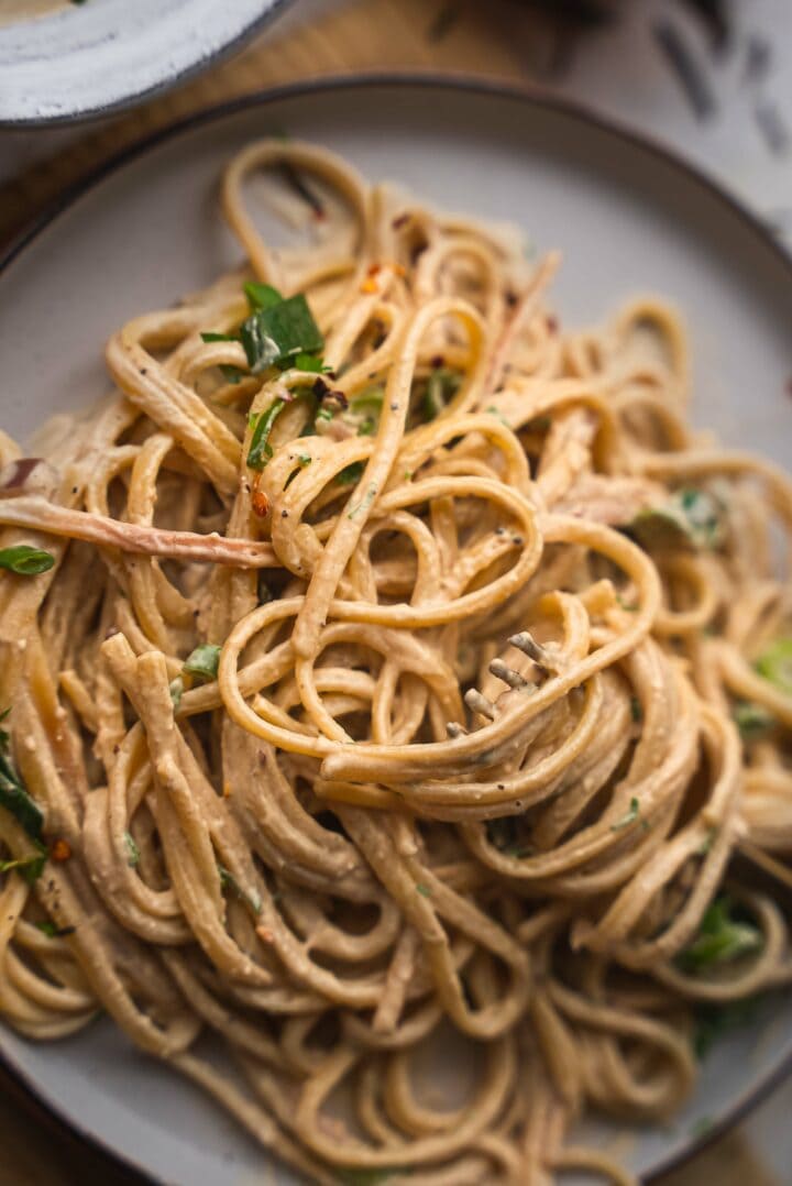 Tahini tofu pasta on a plate