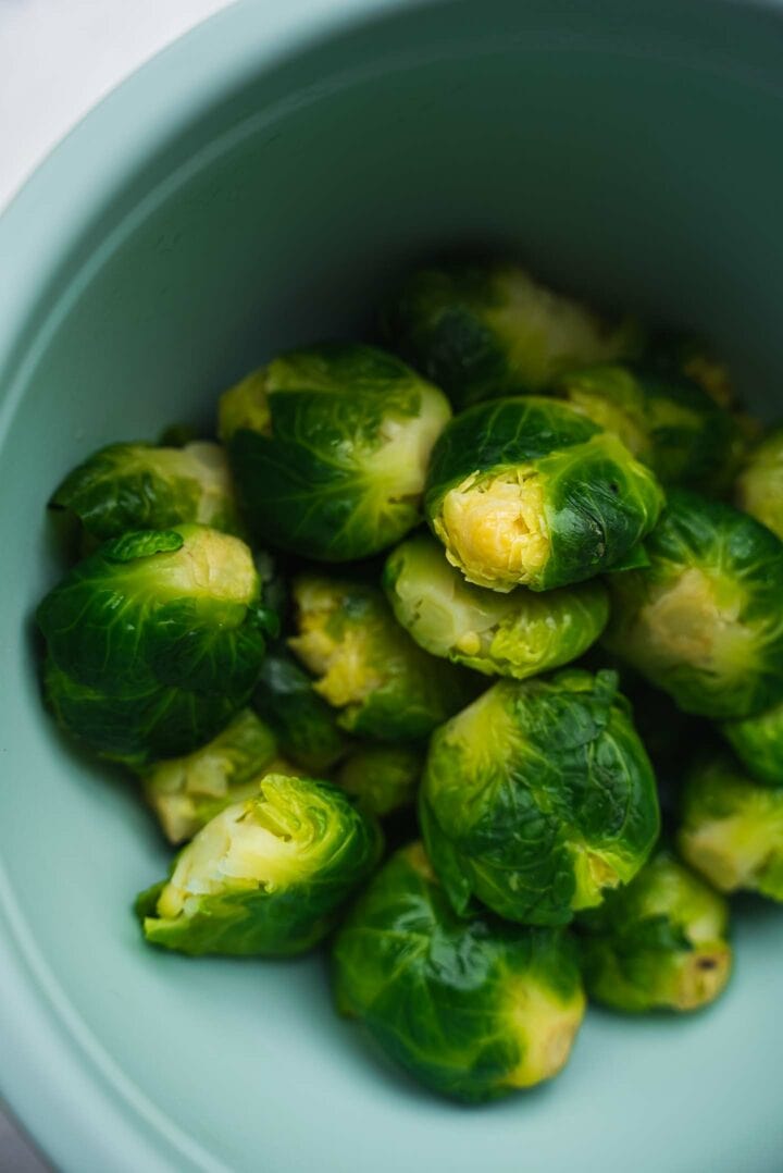 Brussels sprouts in a mixing bowl