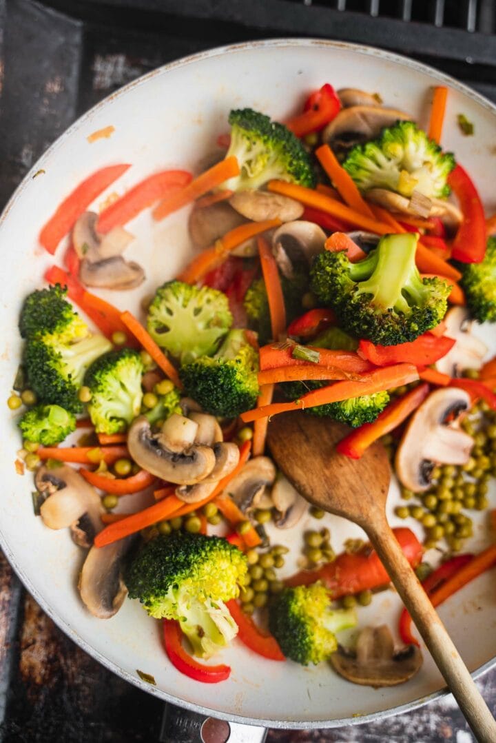Broccoli and mushrooms in a frying pan