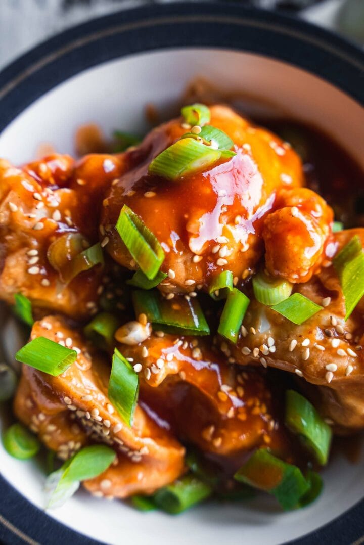 Orange cauliflower wings with scallions