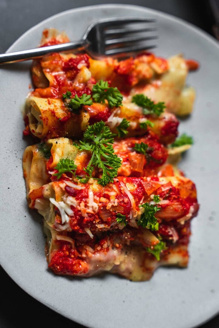Vegan cannelloni with spinach on a plate