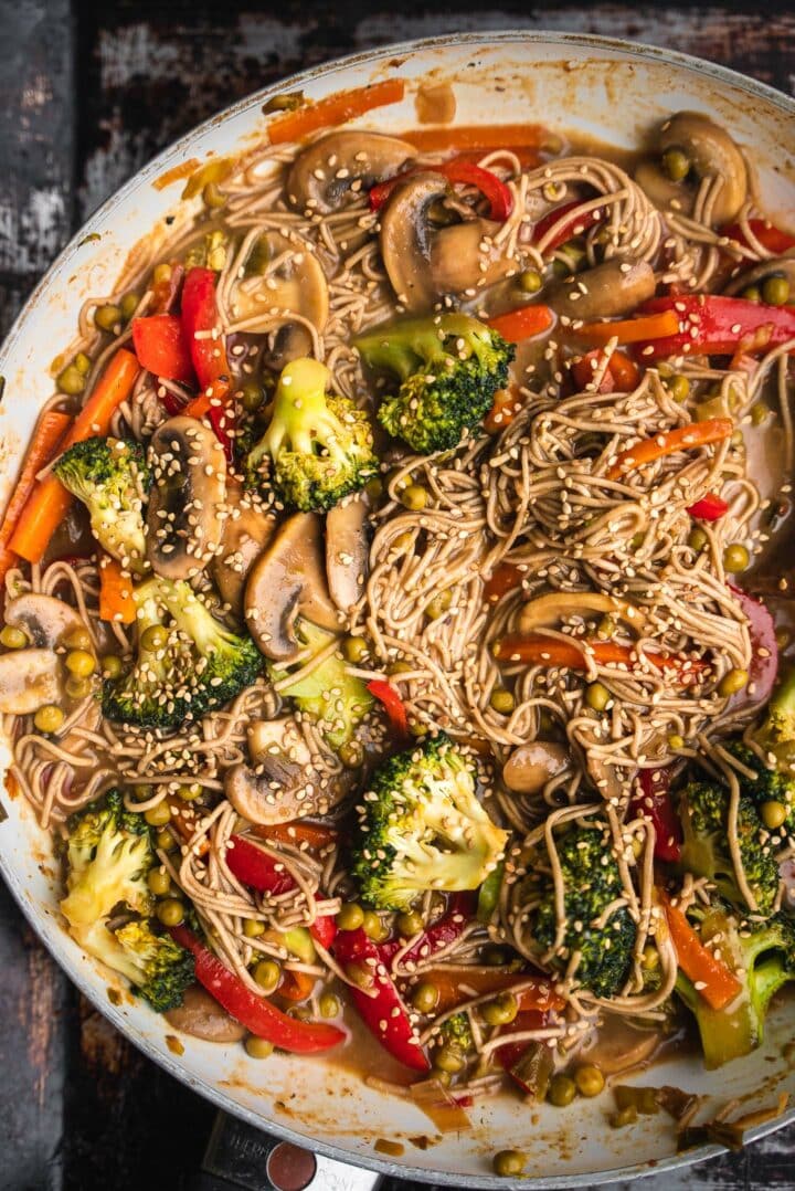Vegetables and noodles in a frying pan